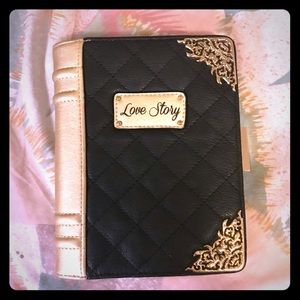 ALDO faux leather black gold fairytale book clutch